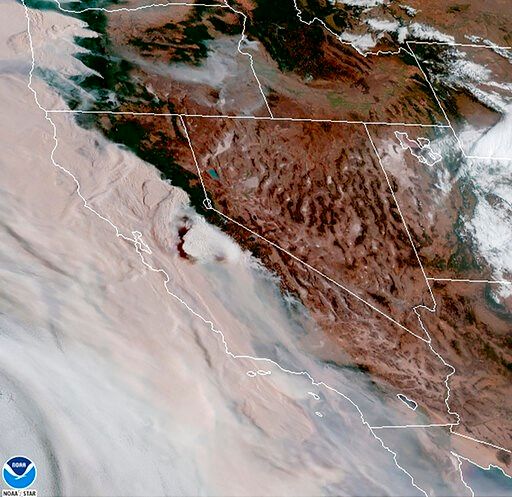 Massive smoke clouds from wildfires darken West Coast sky