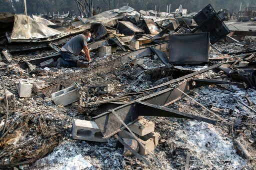Stunned residents tour Oregon town devastated by wildfires