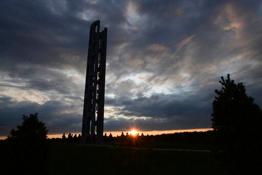 US remembers 9/11, with virus altering familiar tributes