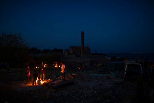 Thousands left homeless by Greek refugee camp fire protest