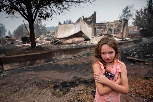 Dozens still missing in Oregon as weather helps fire fight