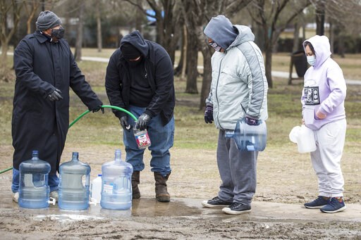 The Latest: Snow, ice, vaccination delays? Time for a movie - Vimarsana News