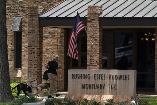 Funerals begin: White gloves, small casket, overflow crowd - Vimarsana News