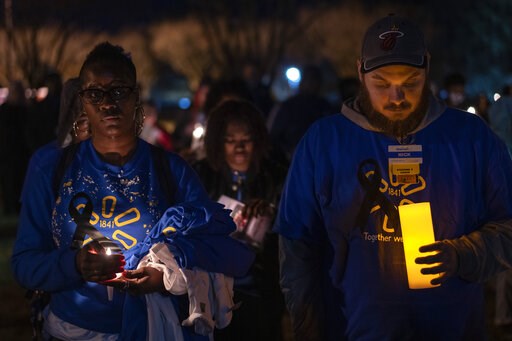 City holds vigil, honors 6 killed in Walmart mass shooting - Vimarsana News