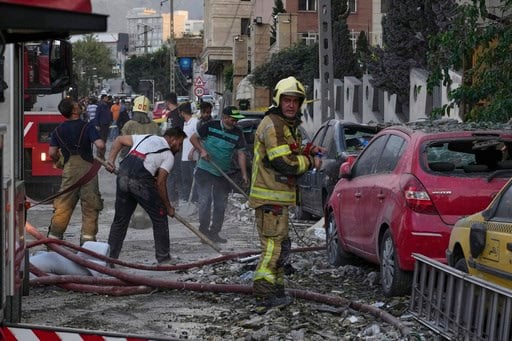 Air raid sirens sound across Israel following an Iranian missile attack on the country