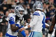 Cowboys honor Kneeland, then get 4 TD passes from Prescott in 33-16 win over Raiders