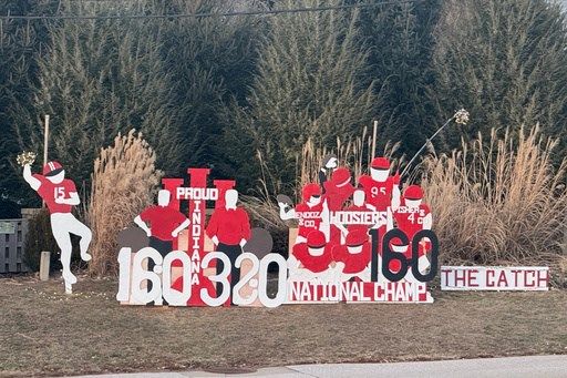 Hoosiers receive hero's welcome in return to Bloomington as football national champions