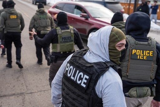 Masks emerge as symbol of Trump's ICE crackdown and a flashpoint in Congress