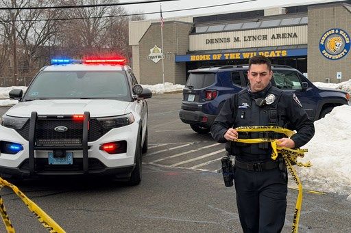 Police credit a good Samaritan for ending a deadly shooting at a Rhode Island ice rink