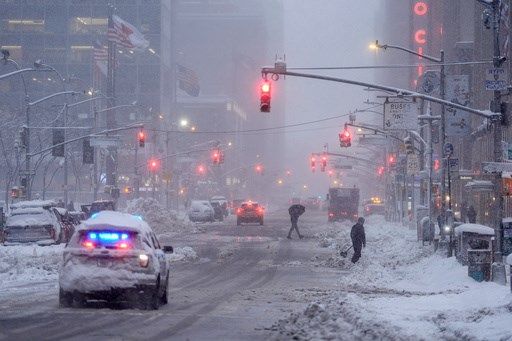 The Latest: Snowfall intensifies in Northeast as many are under blizzard warnings and travel bans