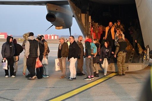Governments scramble to bring citizens home during travel chaos caused by war in the Middle East